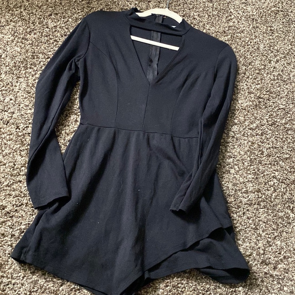 Black CR romper. Sexy front triangular cut.